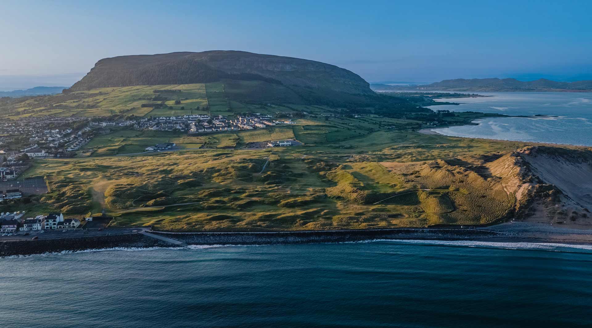 Aerial view of the golf course along the ocean
